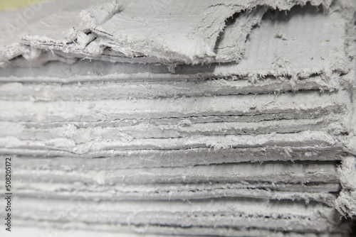 Asbestos sheets in stack - insulator dangerous to health