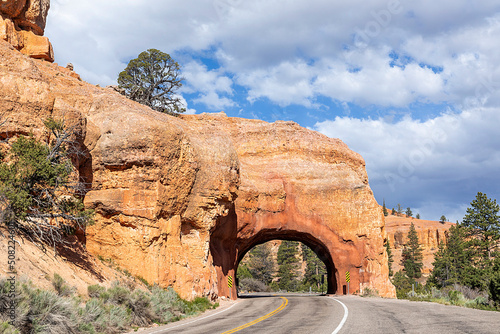 red rock tunnel and arch on the way to the Bryce canyon, USA