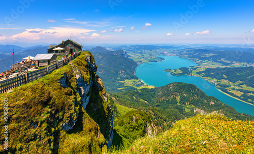 Amazing view from Schafberg by St. Sankt Wolfgang im in Salzkammergut, Haus house Schafbergspitze, lake Mondsee, Moonlake. Blue sky, alps mountains. Upper Austria, Salzburg, near Wolfgangsee, Attersee