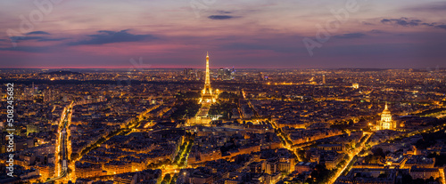 Paris Skyline at Night. Paris, France skyline, panorama at night. The view from Montpanasse Tower. Paris skyline by night. With illuminated city, Invalides, and arc de Triomphe. Paris, France.