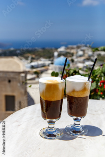Two glasses of Greek frappe.