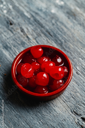 some maraschino cherries in a bowl