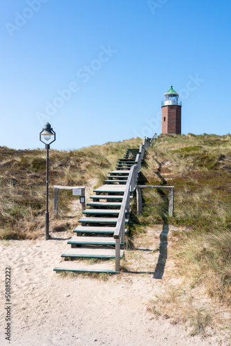 Wooden stairs leading to the Lighthouse Quermarkenfeuer Rotes Kliff (red cliff), Sylt, Schleswig-Holstein, Germany 
