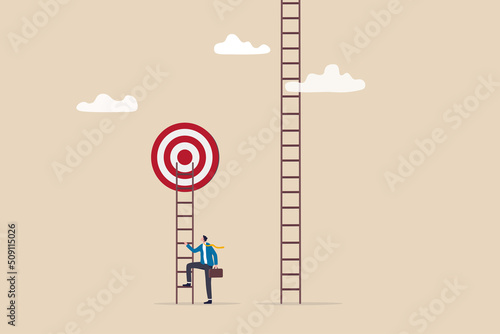 Focus on short term goal to achieve long term success, business strategy or planning, financial goal or project plan concept, smart businessman about to climb up ladder to achieve short term goal.