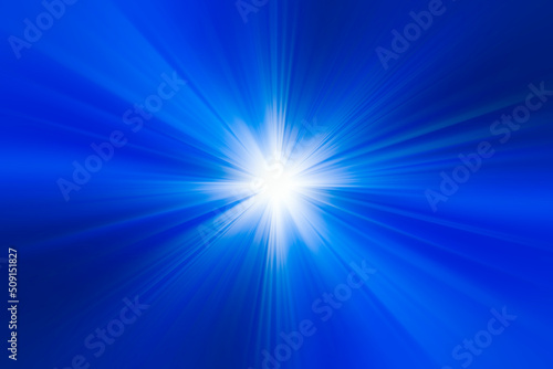 Abstract radial blur surface in in dark blue, light blue and white tones. Abstract blue background with radial, radiating, converging lines. The background is divided into three parts.
