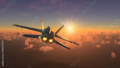 Militar aircraft flying over the clouds in amazing sunset