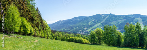 Panorama of the Śnieżnik Massif Mountains - the village of Dolni Morava with the observation tower Walk in the Clouds