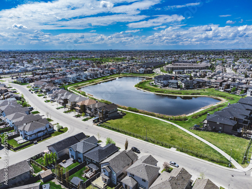 Aerial shot of Edmonton, Alberta, Canada. Stormwater pond. Green space. View for distance. 