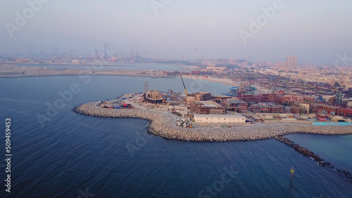 Aerial view of Dubai seaport United Arab Emirates . Top view of the construction of a water port in Dubai