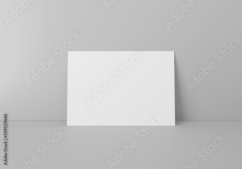 Empty white horizontal rectangle A4 paper sheet mockup on floor over grey wall, 3D rendering