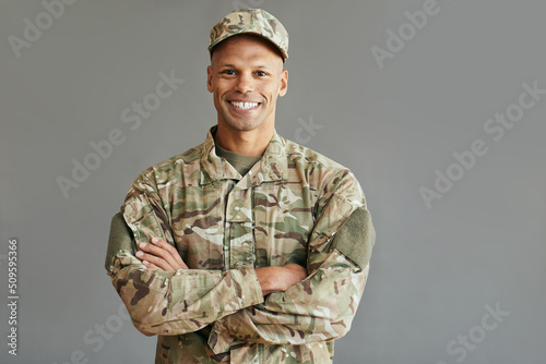 Young confident African American veteran looking at camera.