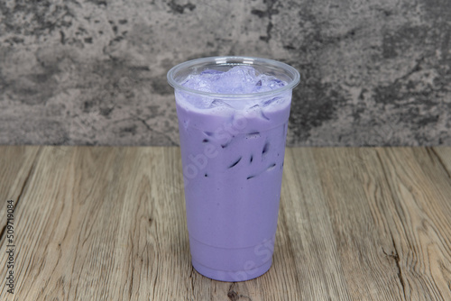 Tasty taro milktea in a tall cup and ice cold for that thirsty appetite