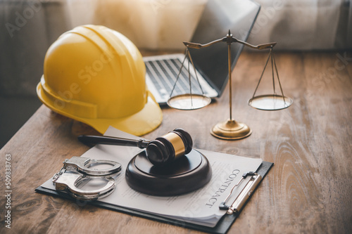 Judge's hammer and helmet Law and Justice about labor law concept Construction law.