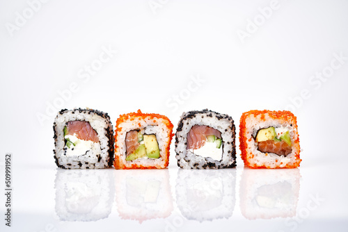  Japenese sushi rolls with fresh salmon, cheese and caviar