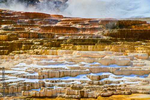 Steamy terraces in Yellowstone with dozens of layers in winter