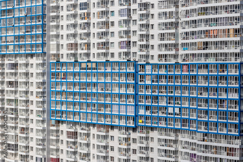 Residential complex, multi-storey residential building - white-blue design of external decoration of walls and balconies