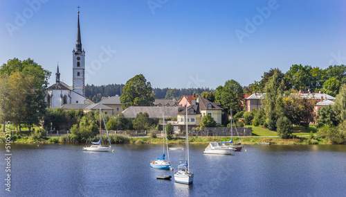 Lake Lipno with sailing boats and the town center in Bohemia, Czech Republic