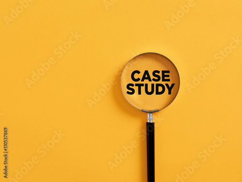 Magnifier focuses on the word case study. Education concept.