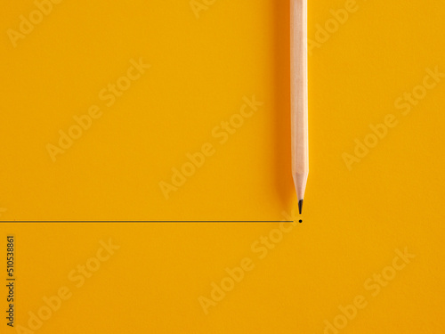 Pencil draws a line and a dot on yellow background. To end or finish something or retirement