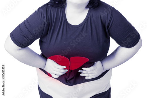 Close up of fat woman suffering from liver pain