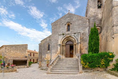 The medieval Saint-Vincent Church in Saint-Rémy-de-Provence, the 12th century building is typical of the constructions in Les Baux with its southern section built half into the rock.