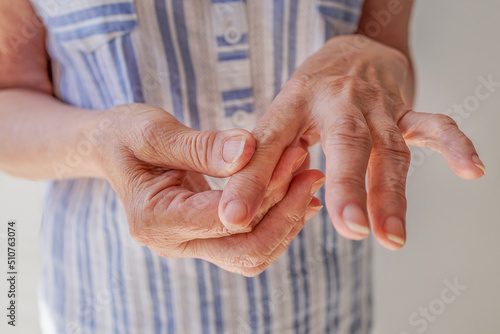 close-up, an old woman makes herself a hand massage, arthritis, arthrosis