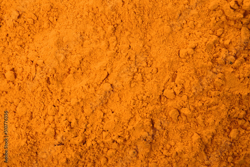 Aromatic saffron powder as background, top view