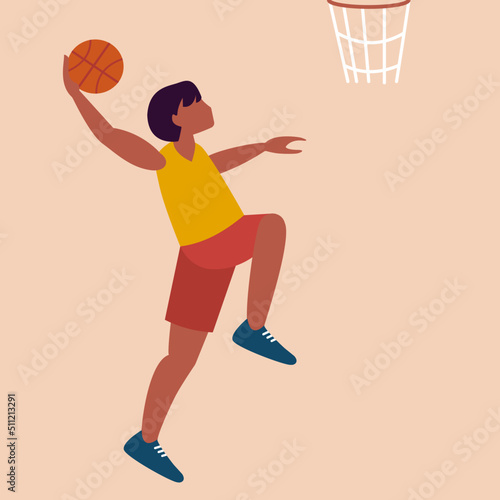 Basketball player shooting ball into basket