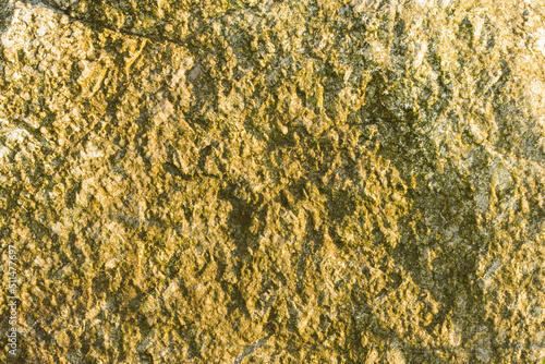 Chropowaty powierzchnia żółtego kamienia
