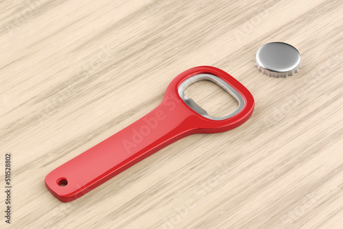 Silver beer cap and red bottle opener on wooden table