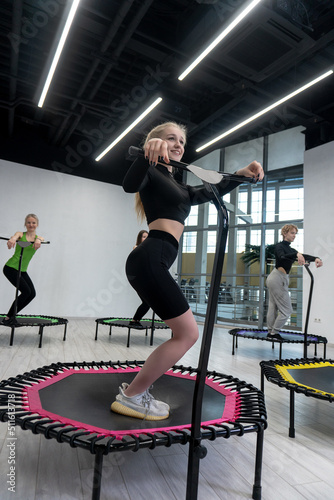 Fitness center group active trampoline friends youth health aerobic training, concept team workout from sport from body indoor, sportswear teamwork. Motion club room,
