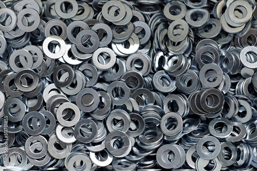 Bunch of stainless steel galvanized flat washers for fastener screws, nuts or bolts