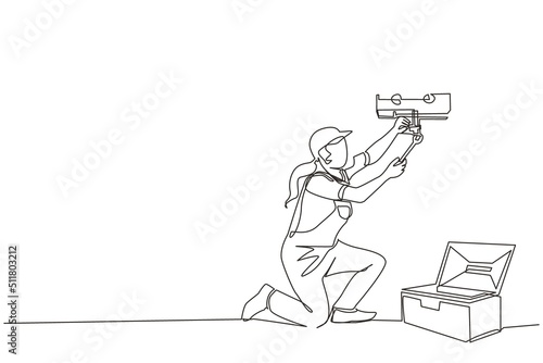 Single one line drawing female plumber in overall is installing water heater or boiler. Home repair, maintenance and plumbing services. Handywoman concept. Continuous line draw design graphic vector