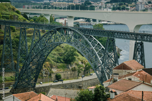 View of the Old Maria Pia Bridge, known as Ponte de Dona Maria Pia over the Portuguese northern municipalities of Porto and Vila Nova de Gaia.