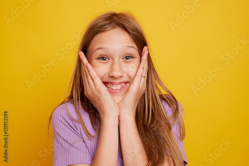 Portrait of a young human girl with a shocked expression, horizontal banner design, copy space