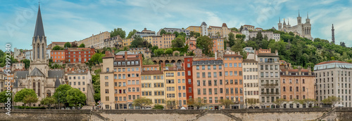 Colorful houses of Vieux Lyon on the River Saône quayside, overlooked by Renaissance-era mansions withmedieval Cathédrale Saint-Jean-Baptiste