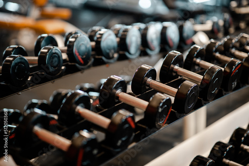 Background of rows of dumbbells in the gym, Lifestyle and sport exercise concept.