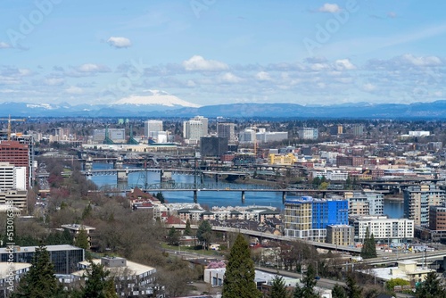 Cityscape view of Portland Oregon bridges and urban buildings over the water