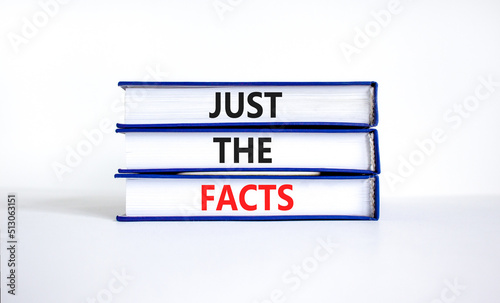 Just the facts symbol. Concept words Just the facts on books on a beautiful white table white background. Business and just the facts concept. Copy space.