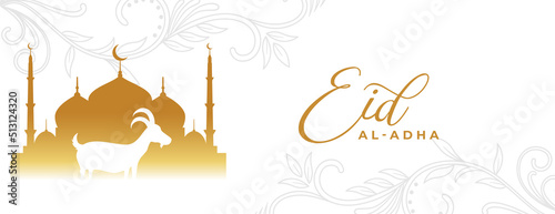 eid al adha mubarak in golden and white banner with mosque and arabic floral design