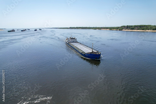 Cargo transportation. An old cargo ship on the Volga River transports grain to the port of Volgograd. Russia