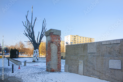Pawiak Prison Museum, tree made of bronze, copy of the famous elm, a witness to history, epitaph signs were placed there by the families of the victims since 1945 in Warsaw, Poland