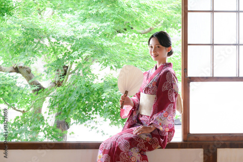 Beautiful Japanese woman smiling in yukata