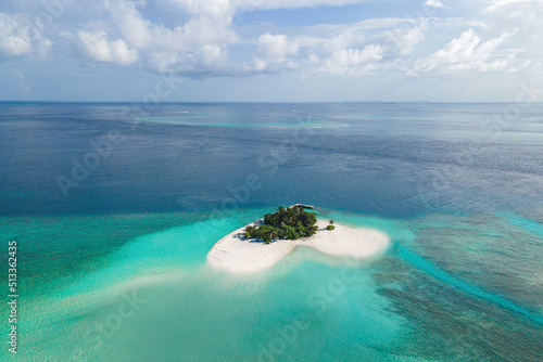 Aerial view in Maldives atoll island. Tropical aerial landscapes of Maldives paradise lagoon beaches.