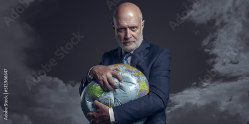 Greedy corporate businessman crushing and exploiting earth