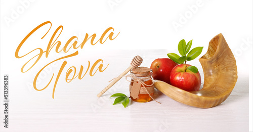 Red apples, Shofar (horn), honey on white background, Rosh hashanah (jewish New Year holiday). Yom kippur concept.