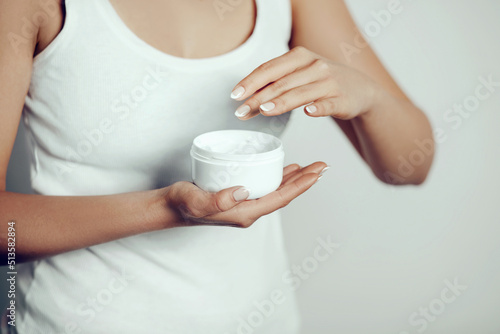 .Skin Care Concept. Beautiful Woman With Hand Cream, Lotion On Her Hands. Close Up Photo of Female Hands Applying Cosmetic Cream On Soft Skin. Beauty Concept
