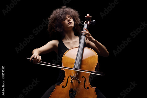 Female artist playing a contrabass