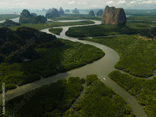 Aerial view of a swerving river through a series of limestones in Phang Nga Bay