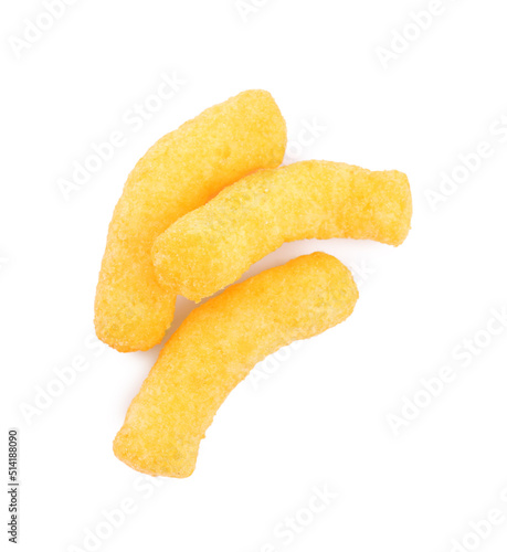 Tasty cheesy corn puffs isolated on white, top view